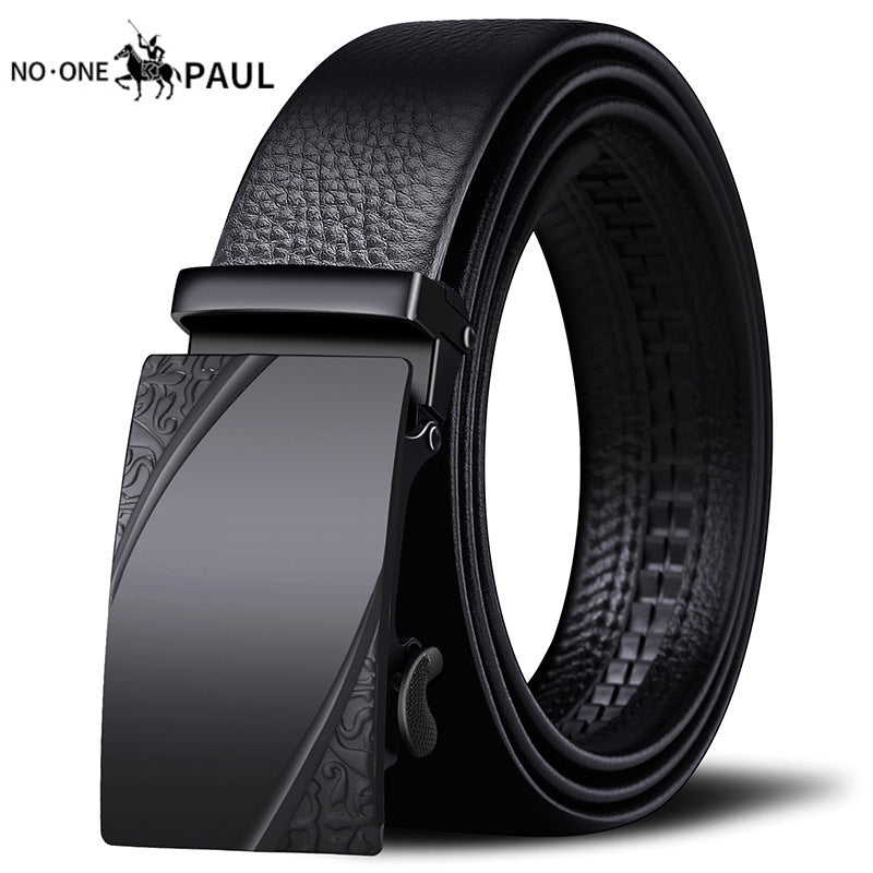 Geometric pattern automatic belt worn with casual denim jeans.