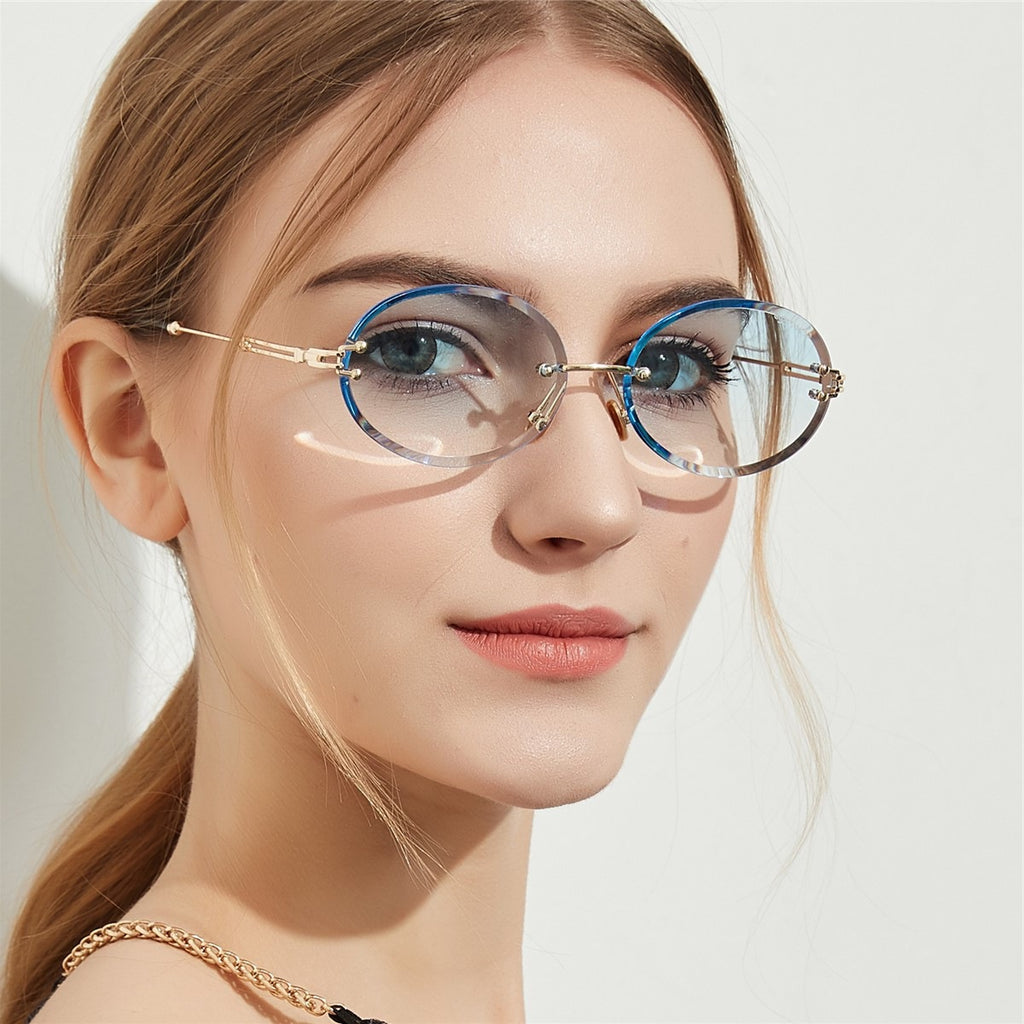 نظارات نسائية بيضاوية كريستال بدون إطار للسيدات