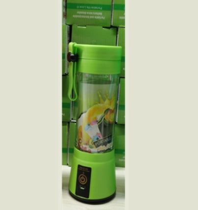 Green blender with a colorful label on a white background